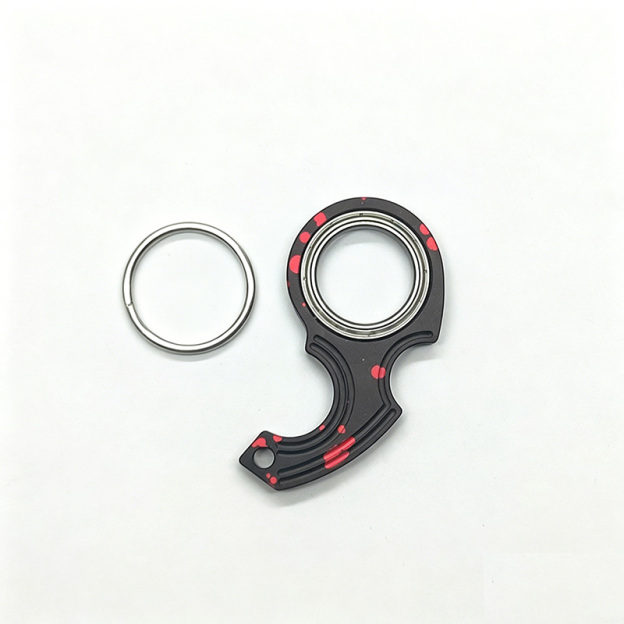 Rotating decompression keychain