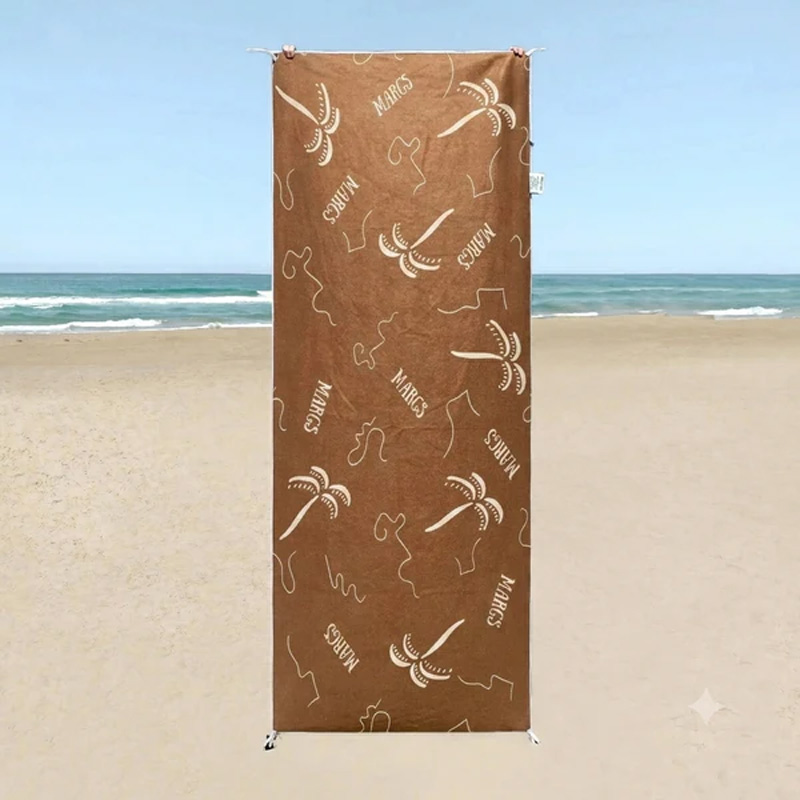 Portable beach towel with pocket