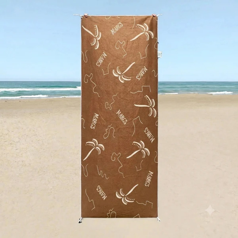 Portable beach towel with pocket