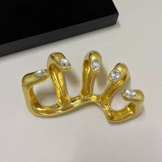 Sculptural hand-armor ring