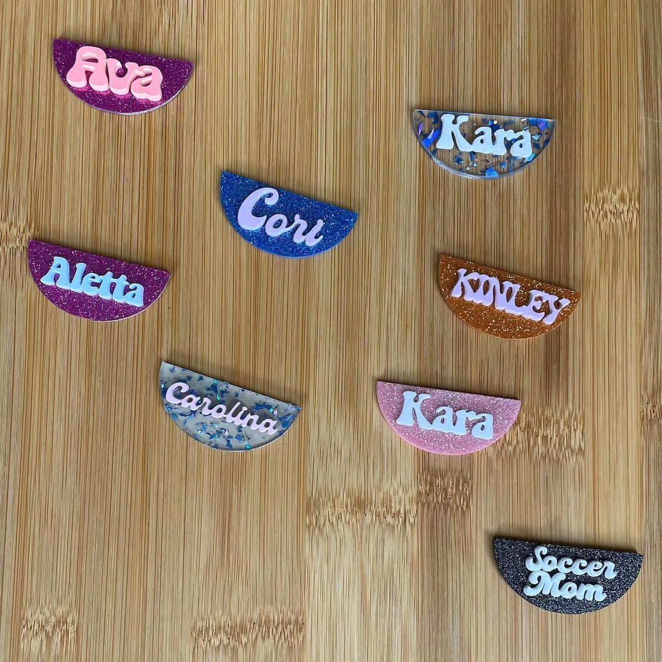 Reusable adhesive nameplate