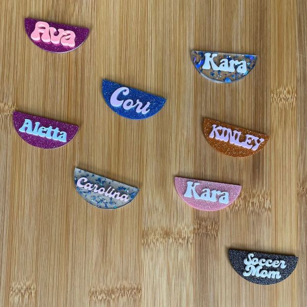 Reusable adhesive nameplate