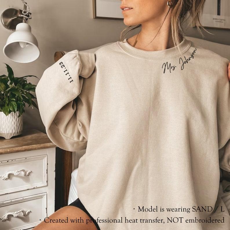 Personalized Mrs Sweatshirt, Custom Wedding Gift, Anniversary Gift for Her, Mrs Neckline Embossed Sweater, Wedding Date Sleeve, Bride To Be