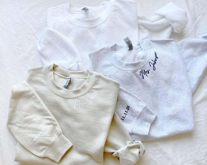 Personalized Mrs Sweatshirt, Custom Wedding Gift, Anniversary Gift for Her, Mrs Neckline Embossed Sweater, Wedding Date Sleeve, Bride To Be