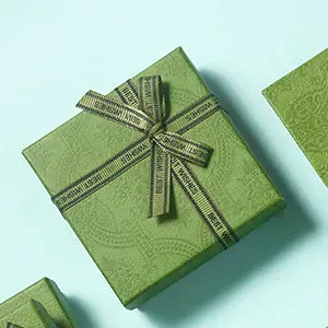 About 3in ornaments/keychain gift boxes