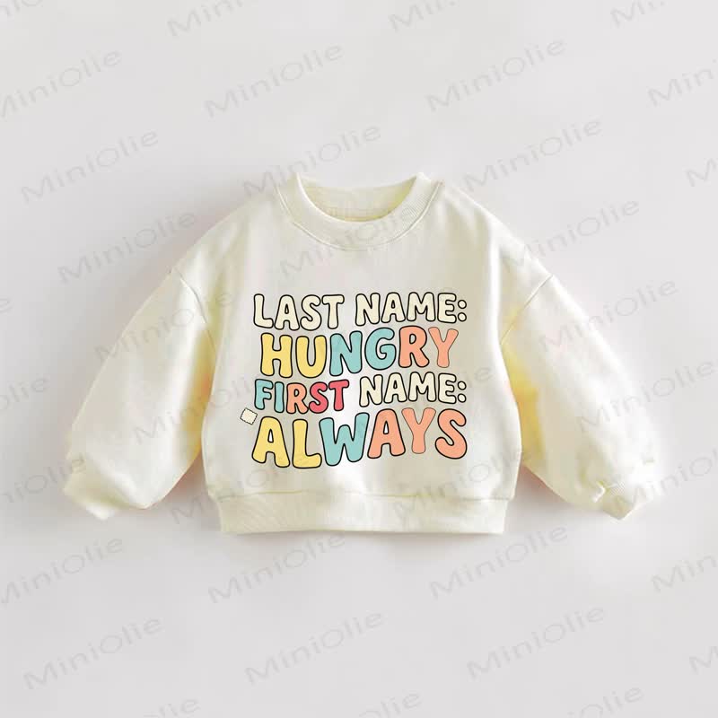 LAST NAME: HUNGRY FIRST NAME: ALWAYS Baby Toddler Cream Sweatshirt - Cream - 3-5T - image 1