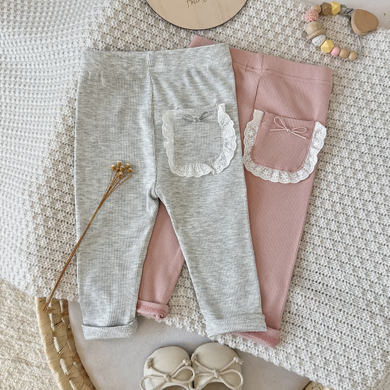 Baby Girl Solid Color Ribbed Lace Pocket Leggings - image 1