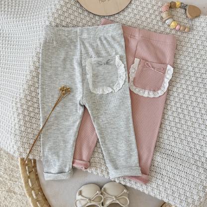 Baby Girl Solid Color Ribbed Lace Pocket Leggings - image 1