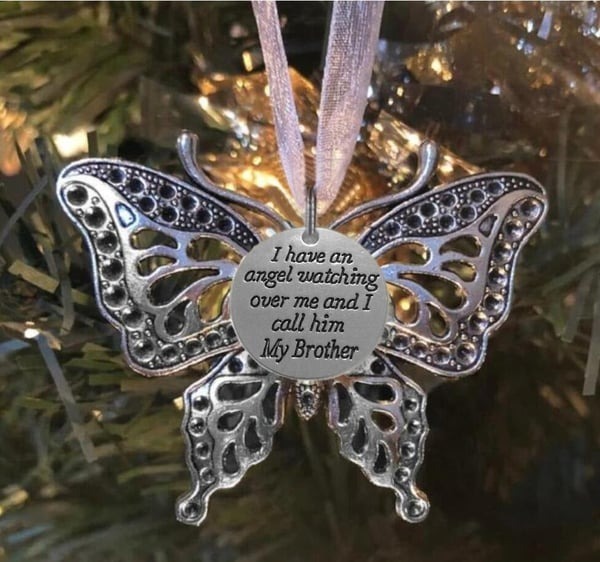 🔥HOT SALE❤️Carving Butterfly Memorial Family Pendant❤️