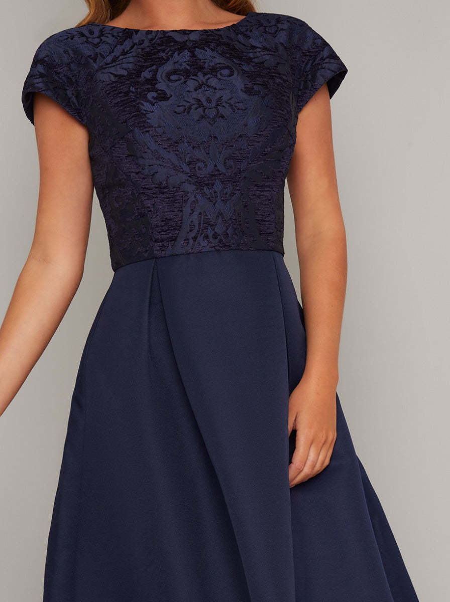 Cap Sleeved Jacquard Dip Hem Midi Dress in Blue