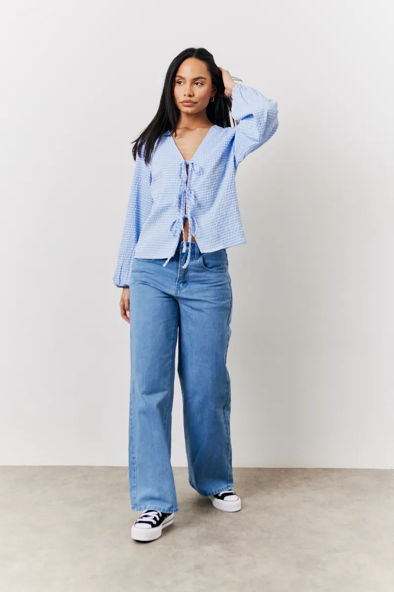 In The Style Gingham Seersucker Tie Front Blouse in Blue