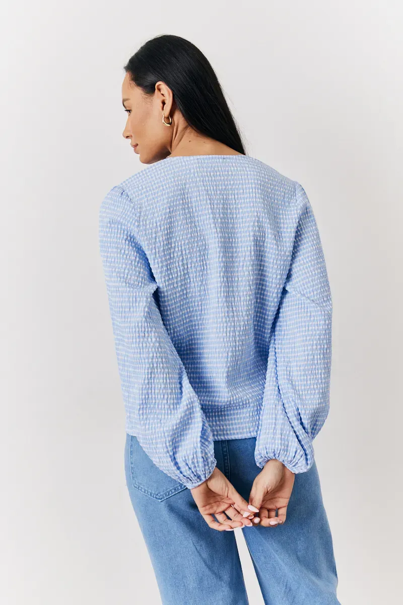 In The Style Gingham Seersucker Tie Front Blouse in Blue