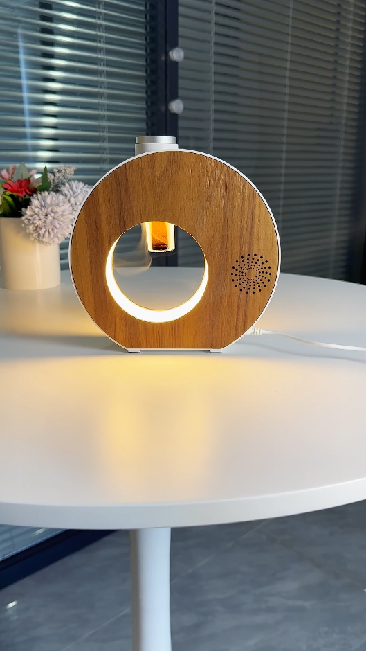 The latest aroma diffuser touch screen control for the night light, which can be connected to Bluetooth to play music （TK Live）
