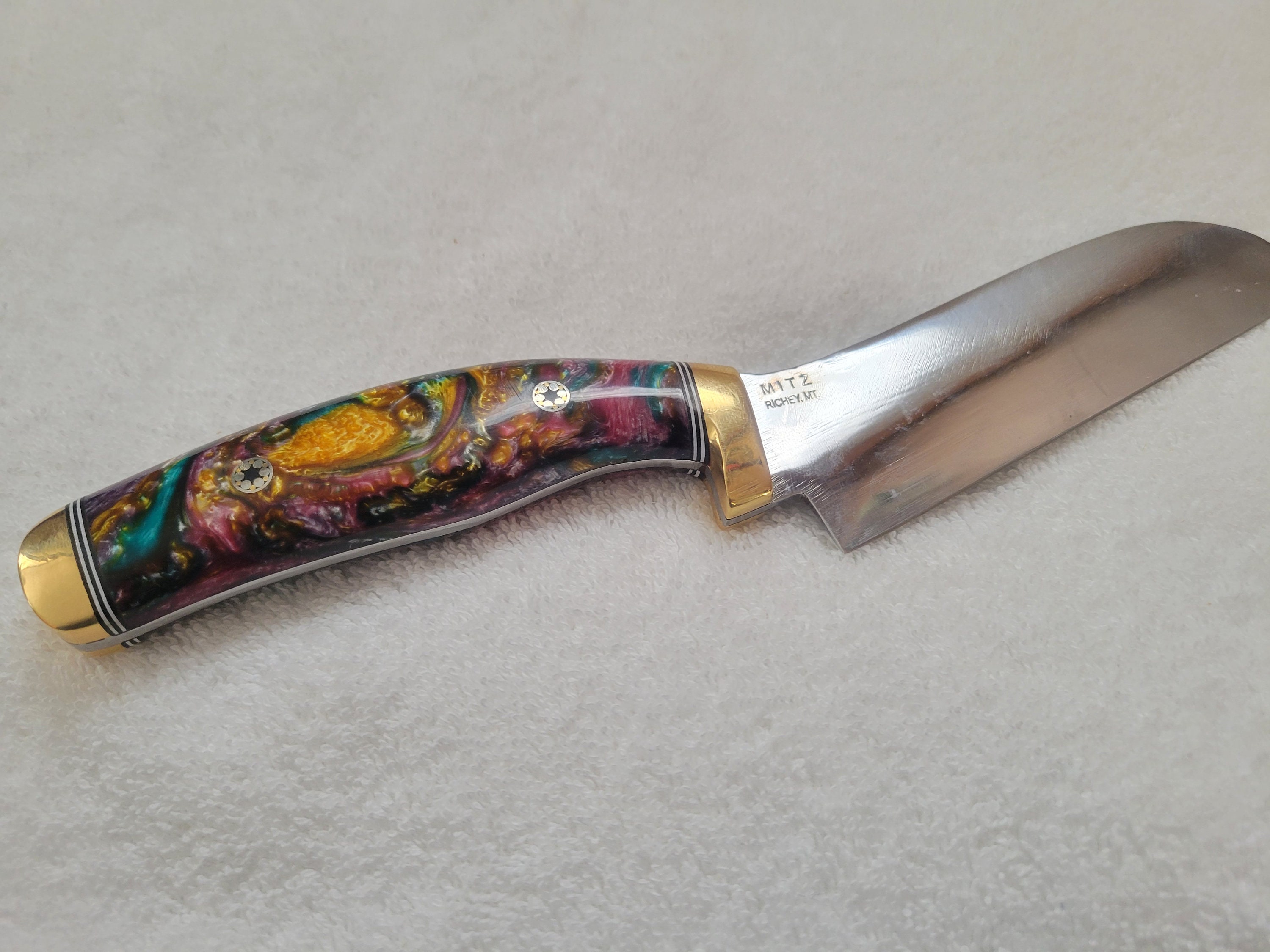 Handmade knife with abalone (fantasy marble) handle and steel blade.
