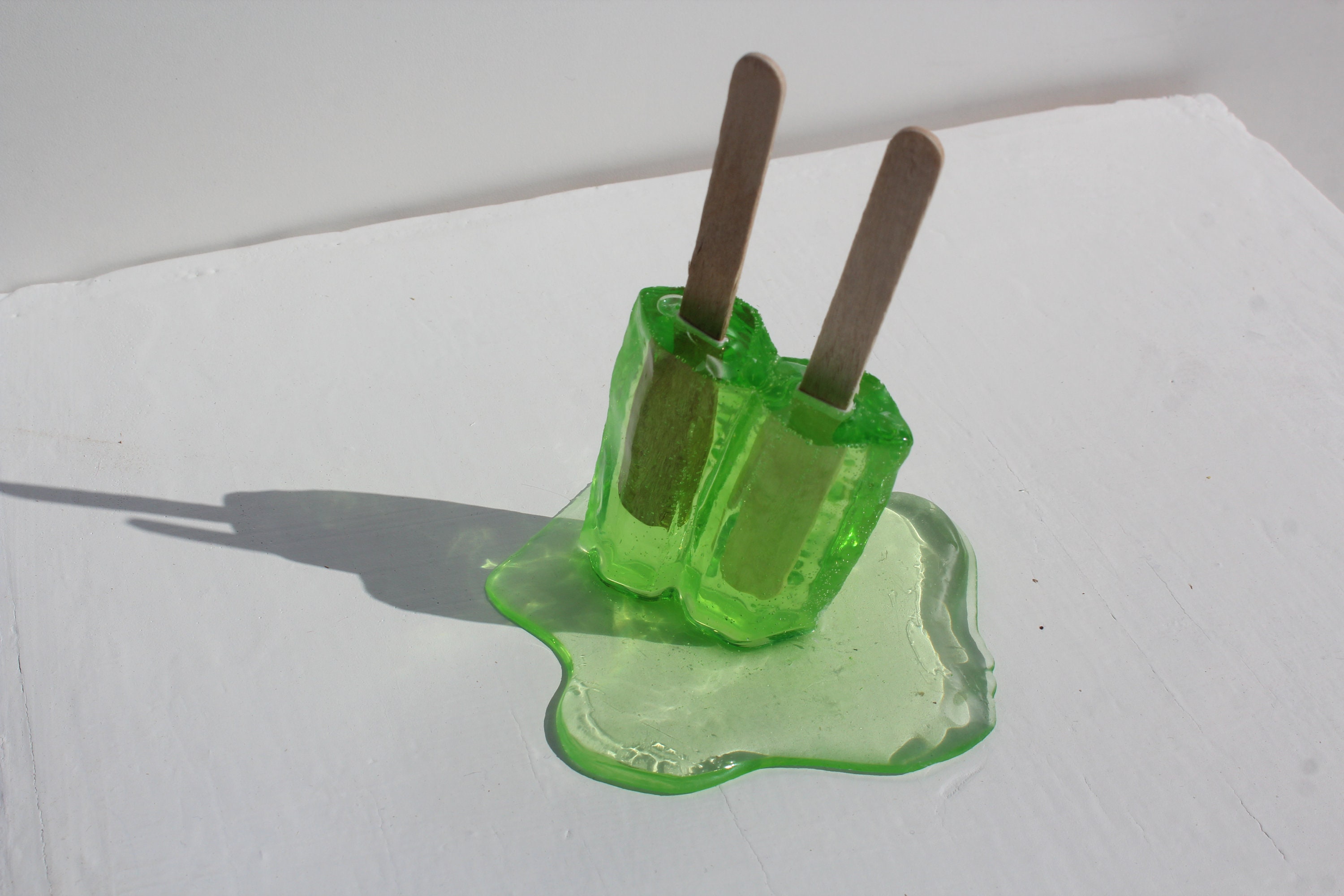 Resin twin popsicle double stick melting sucker sculptures
