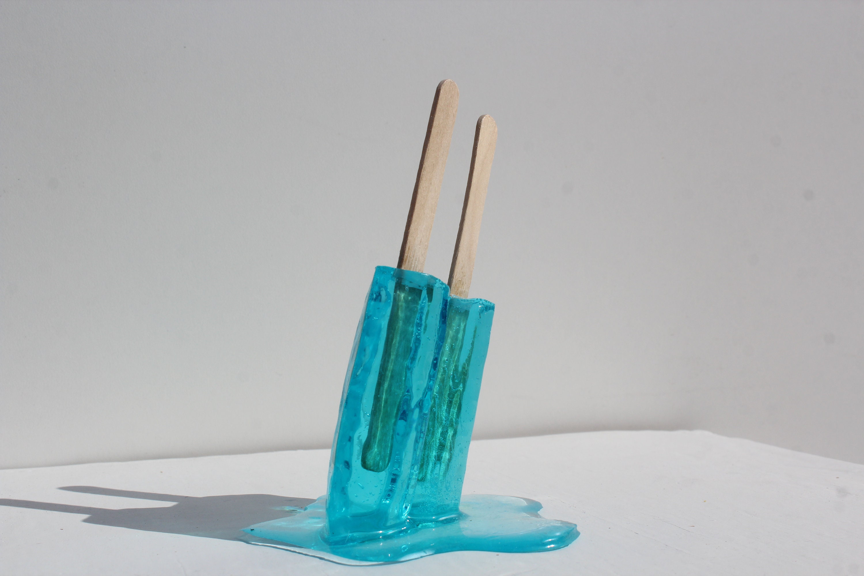 Resin twin popsicle double stick melting sucker sculptures