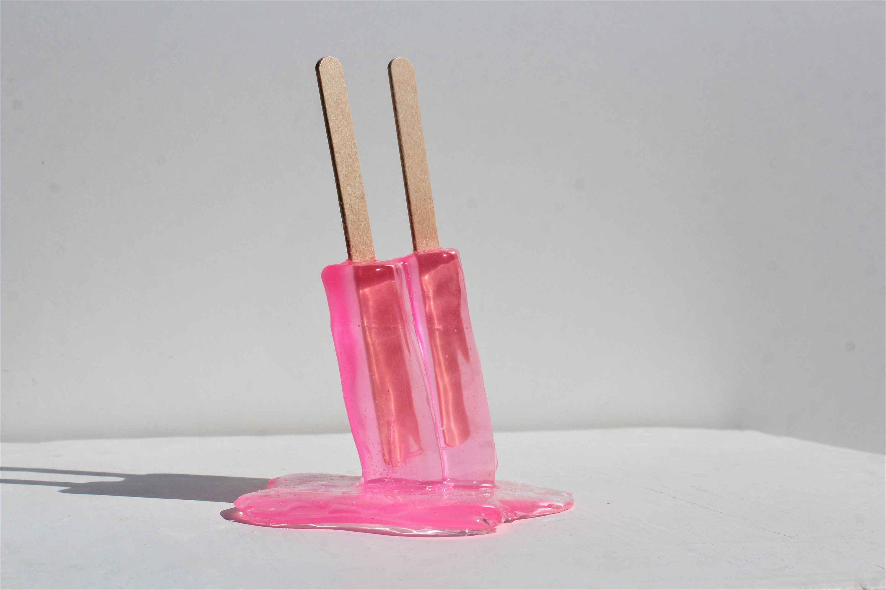 Resin twin popsicle double stick melting sucker sculptures