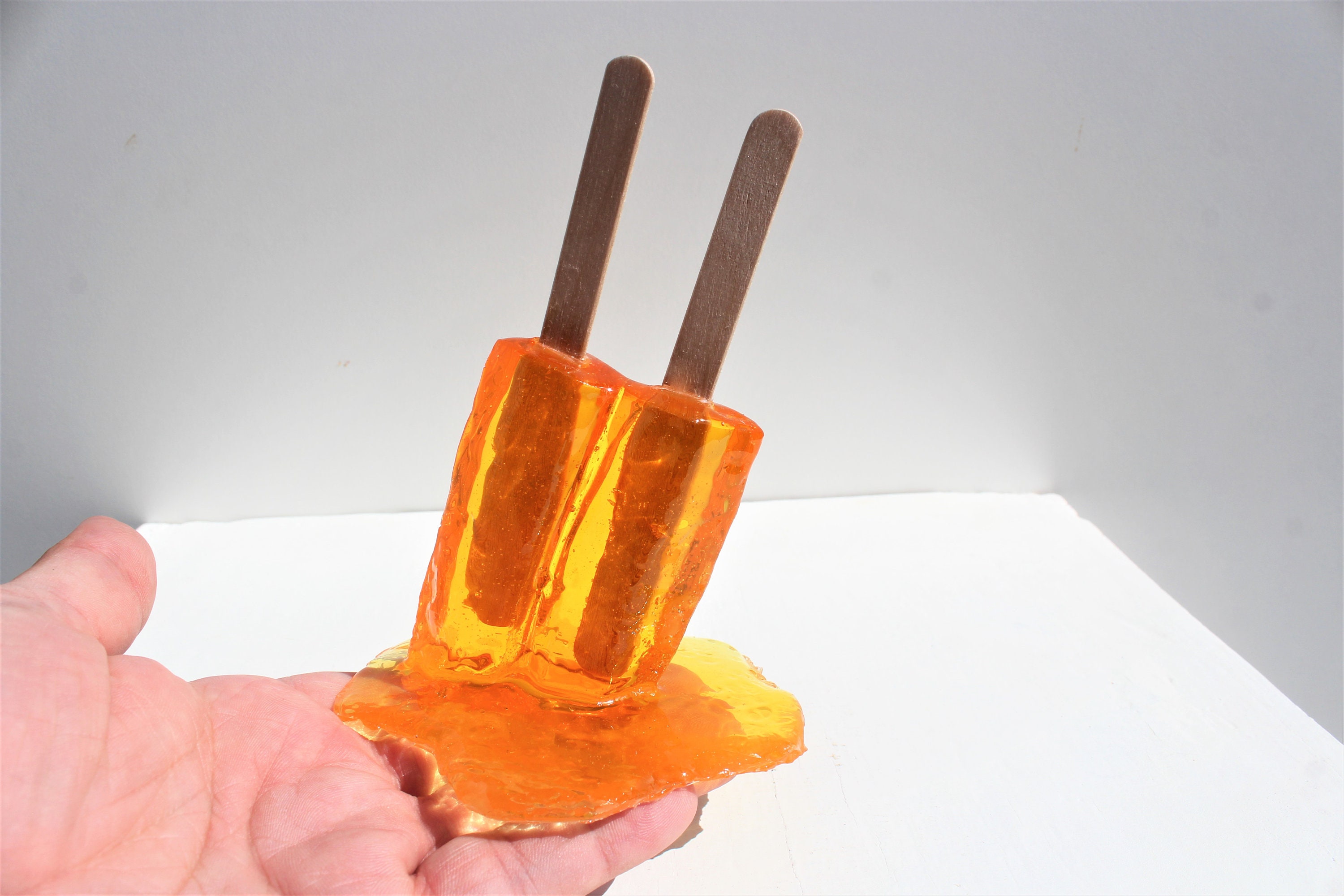 Resin twin popsicle double stick melting sucker sculptures