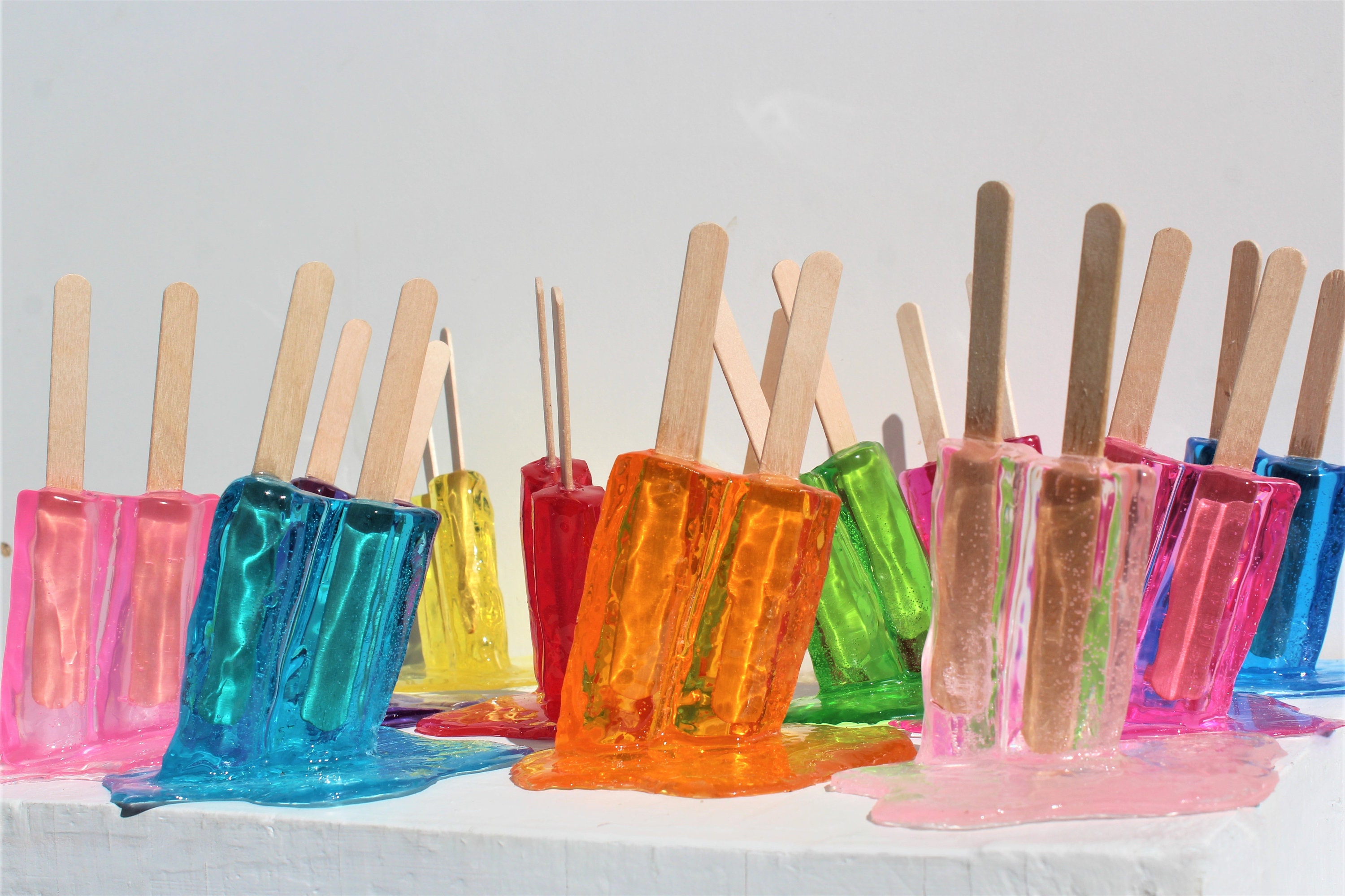 Resin twin popsicle double stick melting sucker sculptures