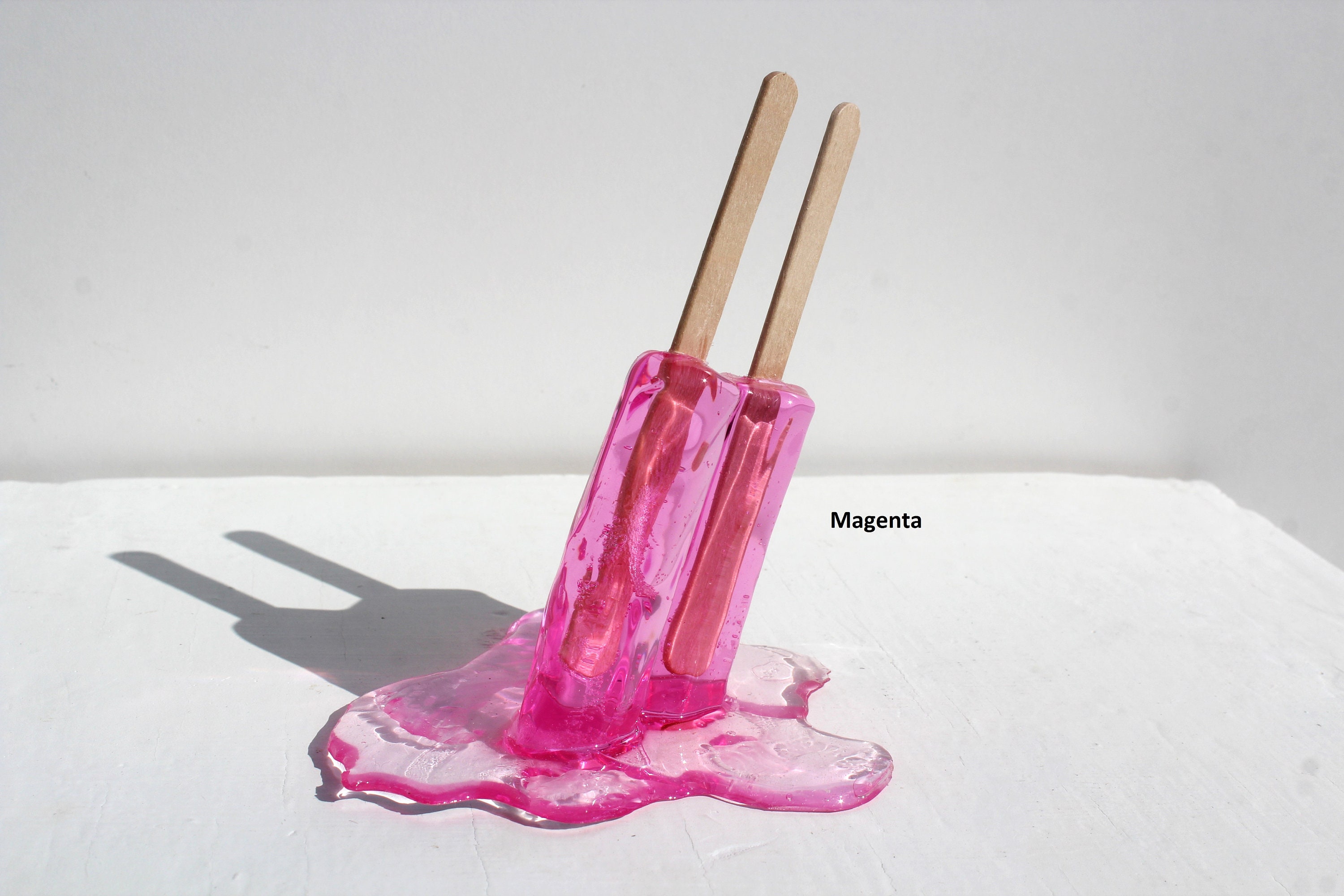 Resin twin popsicle double stick melting sucker sculptures