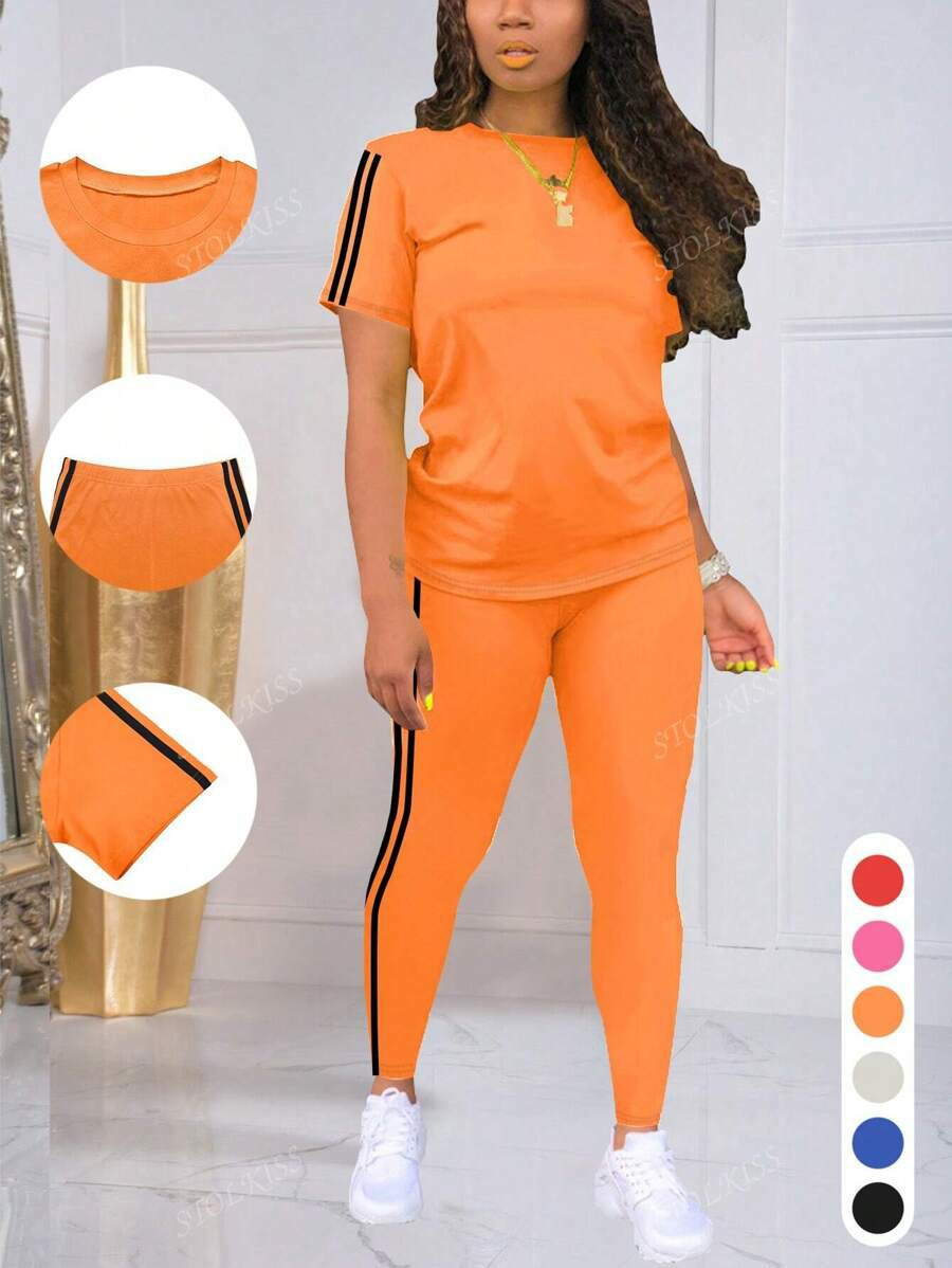 Women's Striped Round Neck Short Sleeve Sports Top And Pants Set