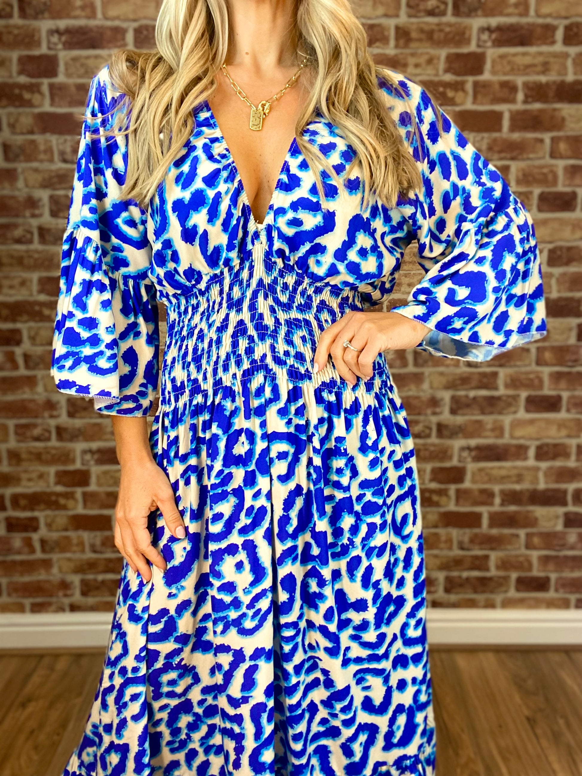 Summer Hot Sale Women's V-neck Half-Sleeve Printed Flowing Stretch Dress