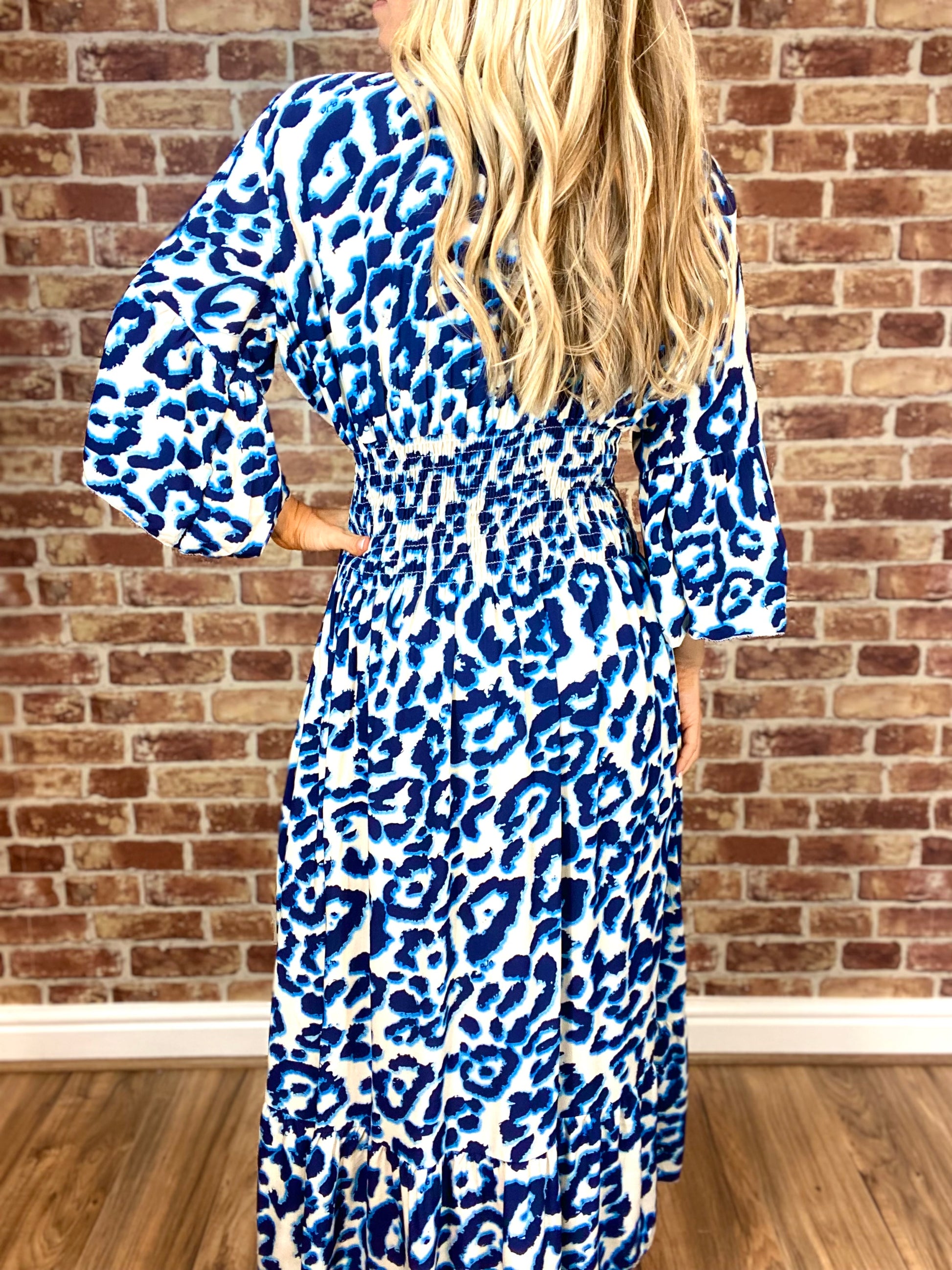 Summer Hot Sale Women's V-neck Half-Sleeve Printed Flowing Stretch Dress