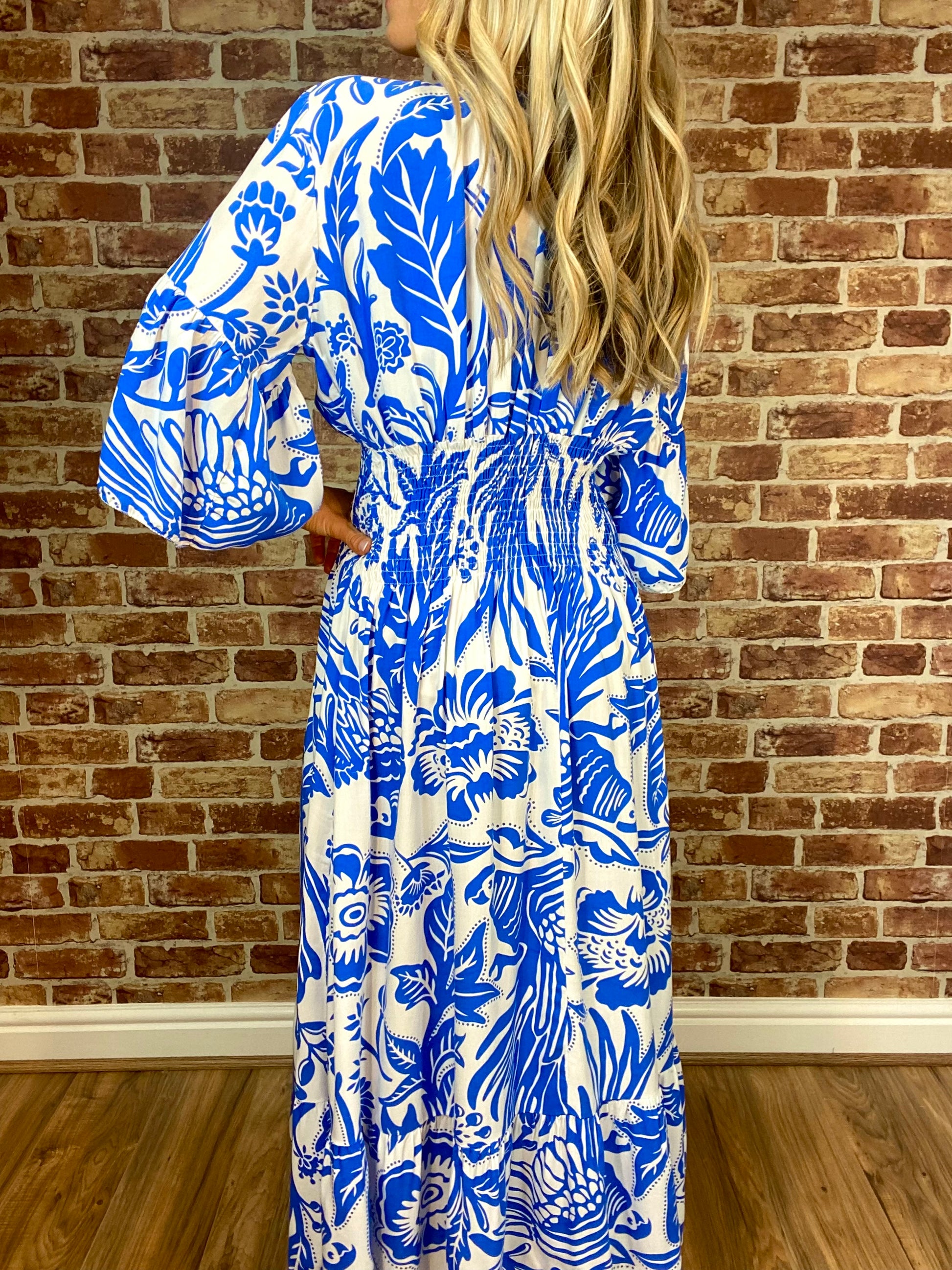 Summer Hot Sale Women's V-neck Half-Sleeve Printed Flowing Stretch Dress