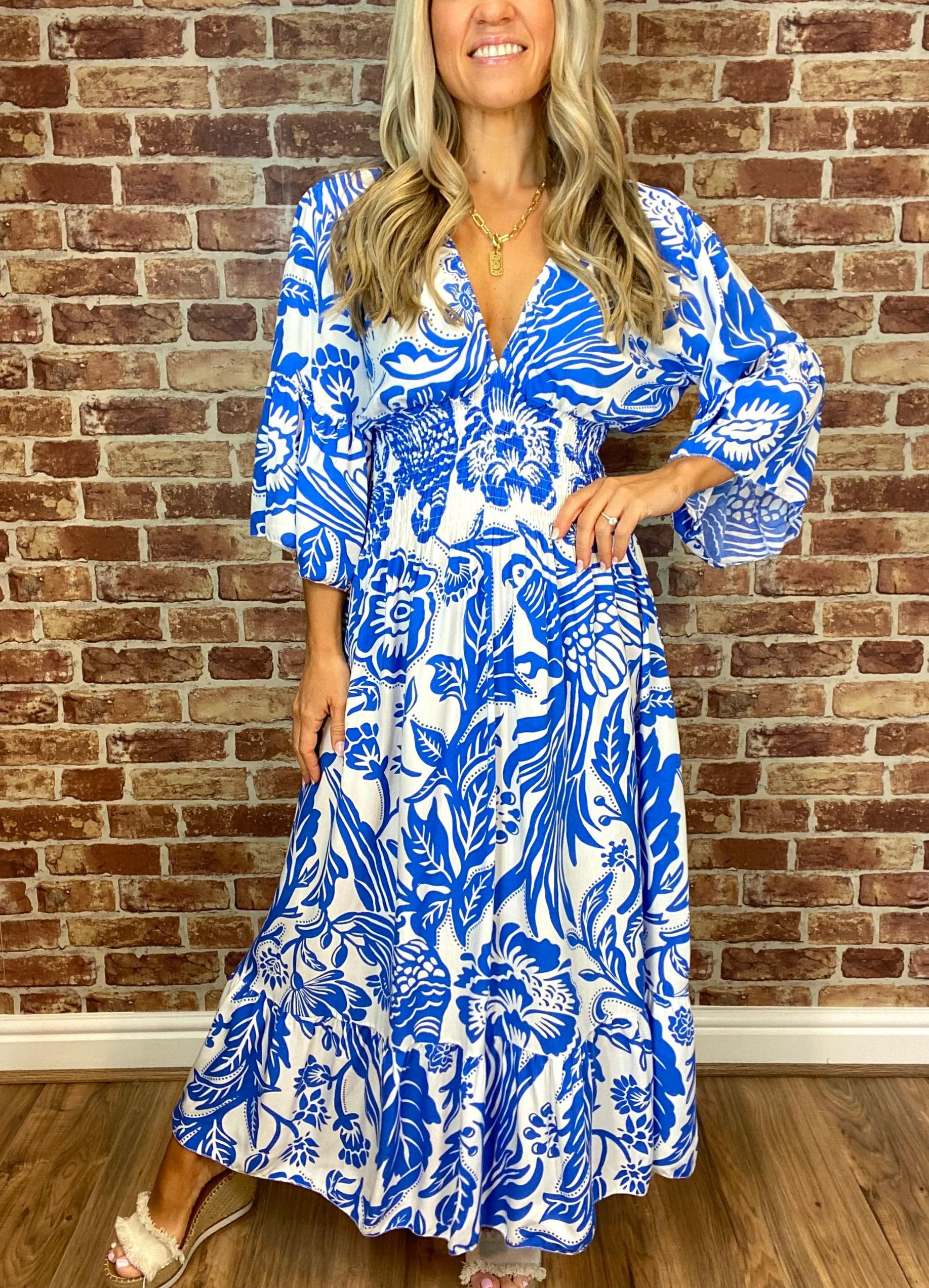 Summer Hot Sale Women's V-neck Half-Sleeve Printed Flowing Stretch Dress