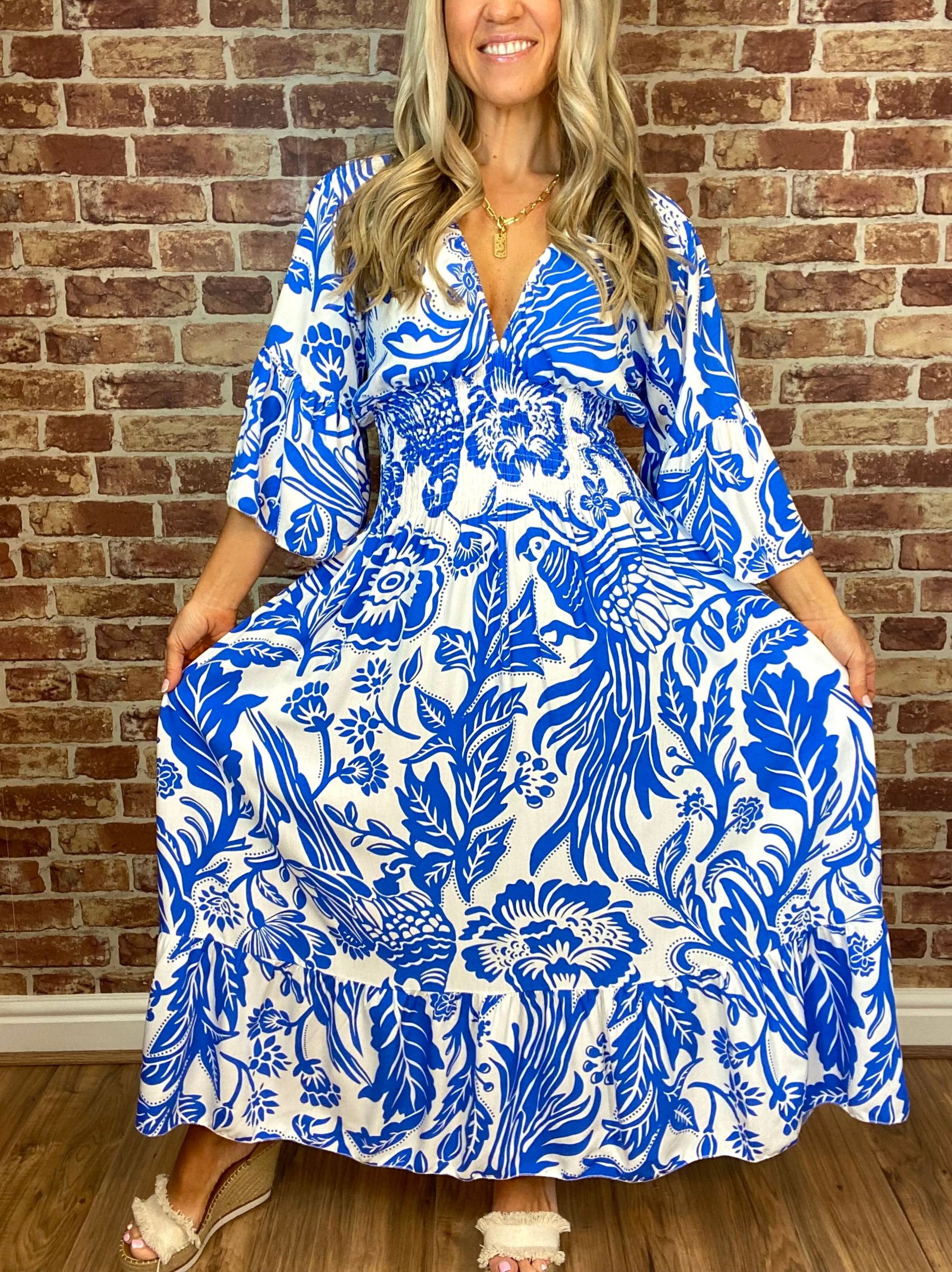 Summer Hot Sale Women's V-neck Half-Sleeve Printed Flowing Stretch Dress