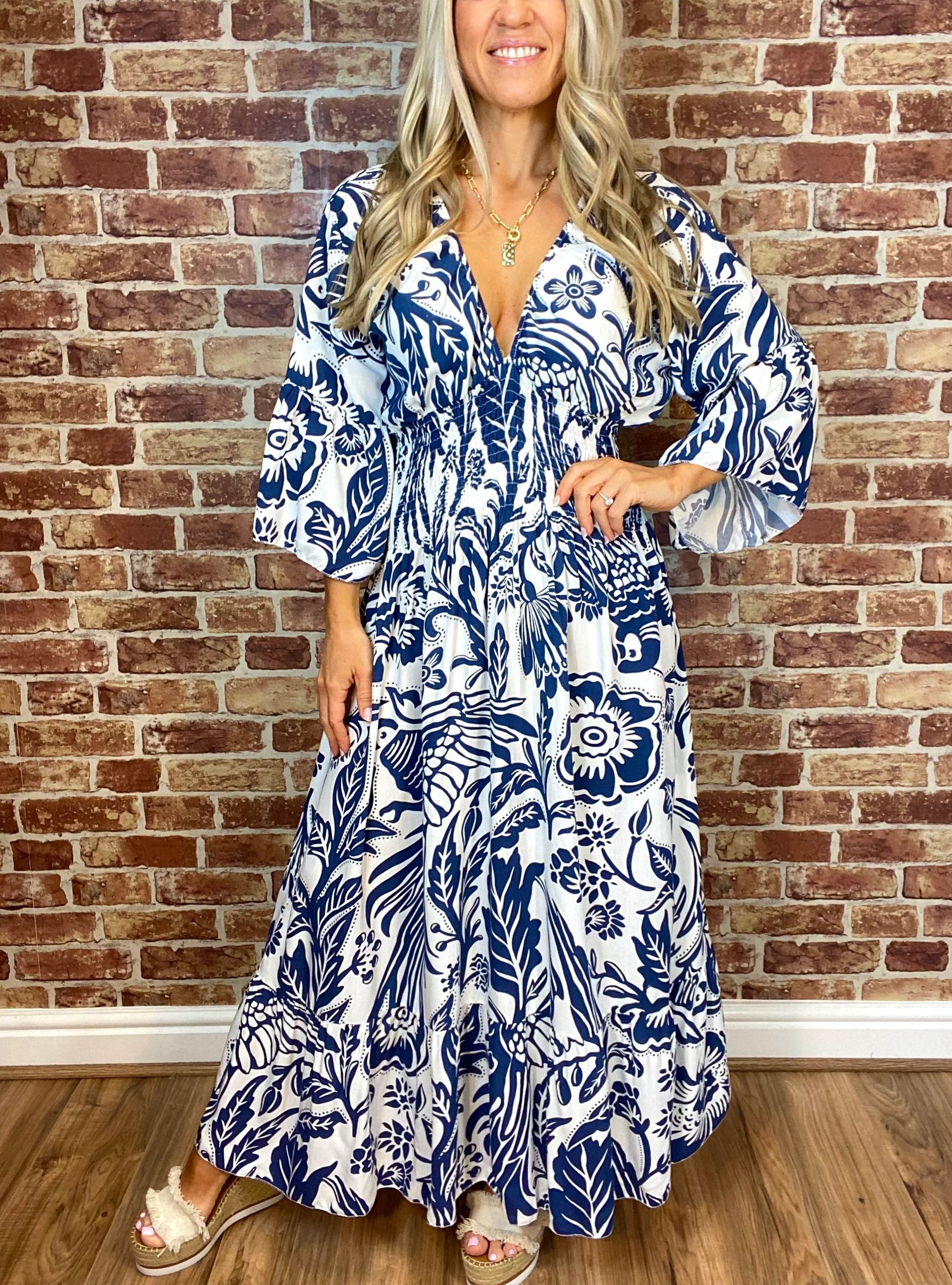 Summer Hot Sale Women's V-neck Half-Sleeve Printed Flowing Stretch Dress