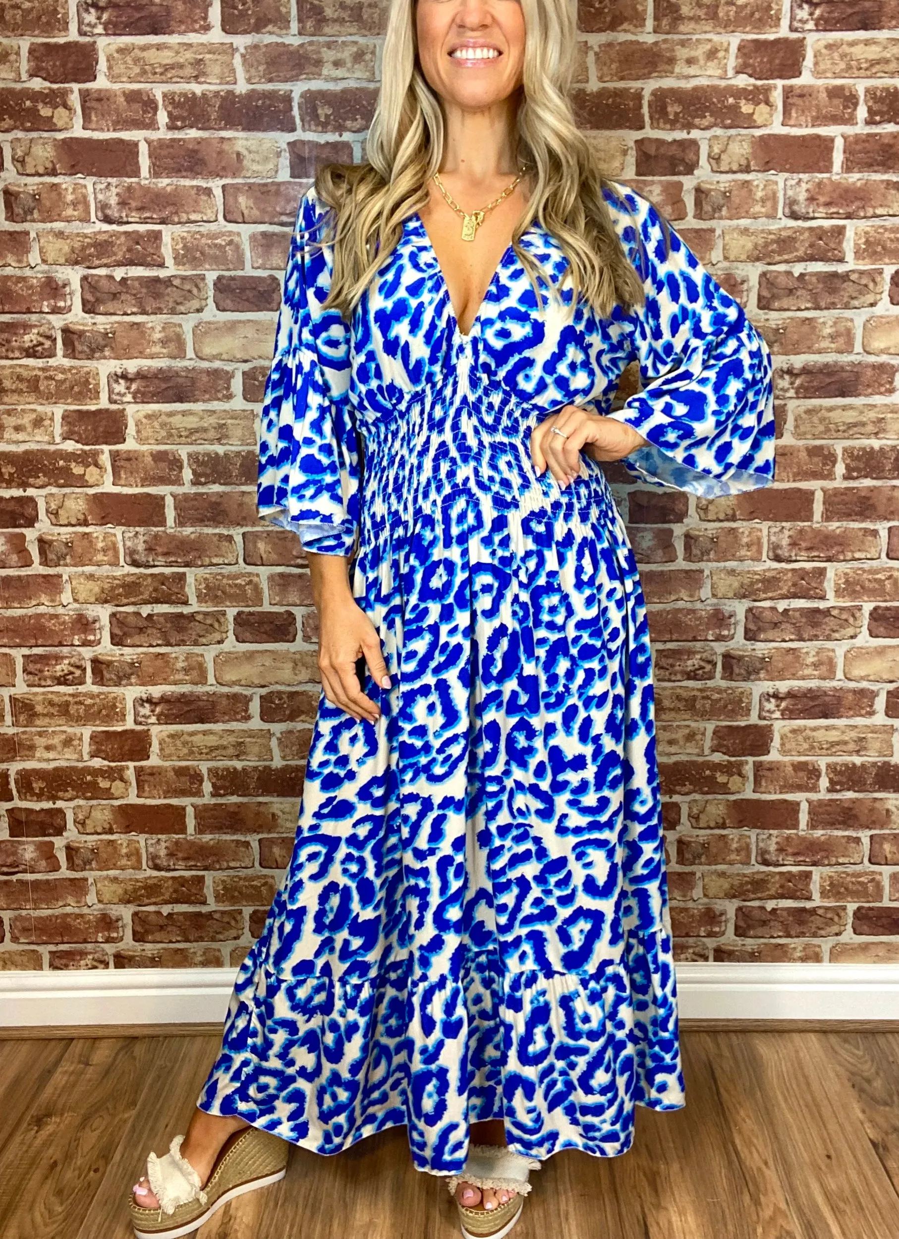 Summer Hot Sale Women's V-neck Half-Sleeve Printed Flowing Stretch Dress