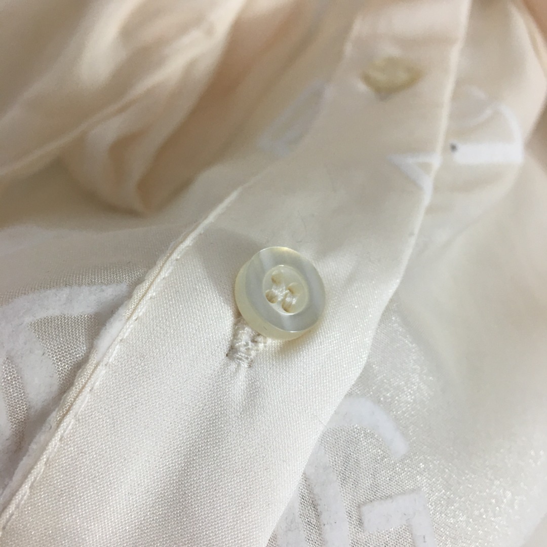 D-G Temperament bow collar flocking letters perspective sunscreen long sleeve shirt,