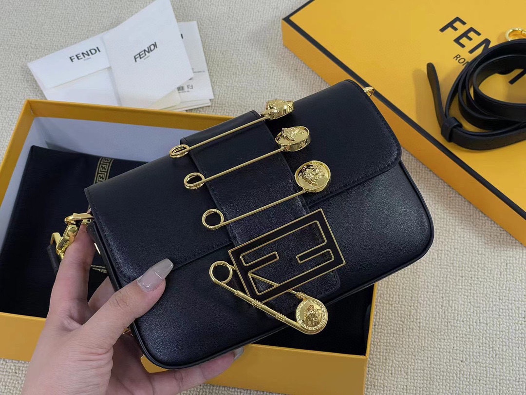 F-I Joint mini golden laser baguette bag in Milan Fashion Week street shooting.