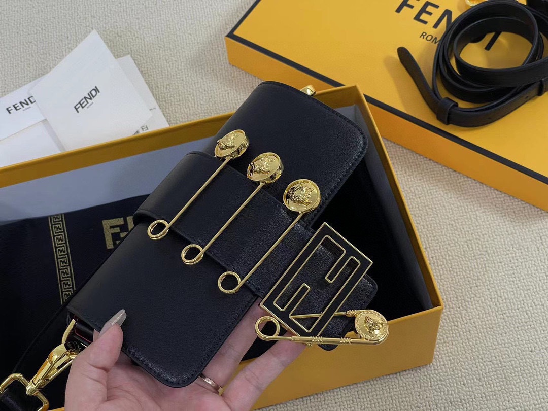 F-I Joint mini golden laser baguette bag in Milan Fashion Week street shooting.