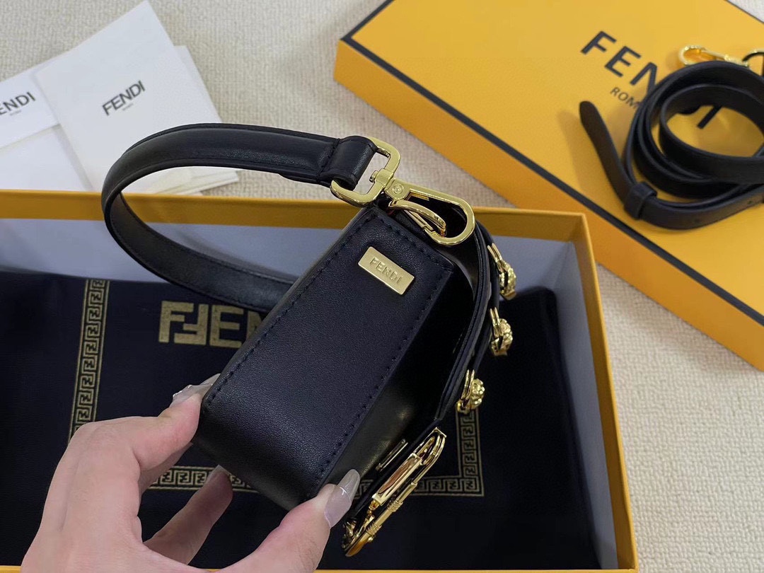 F-I Joint mini golden laser baguette bag in Milan Fashion Week street shooting.