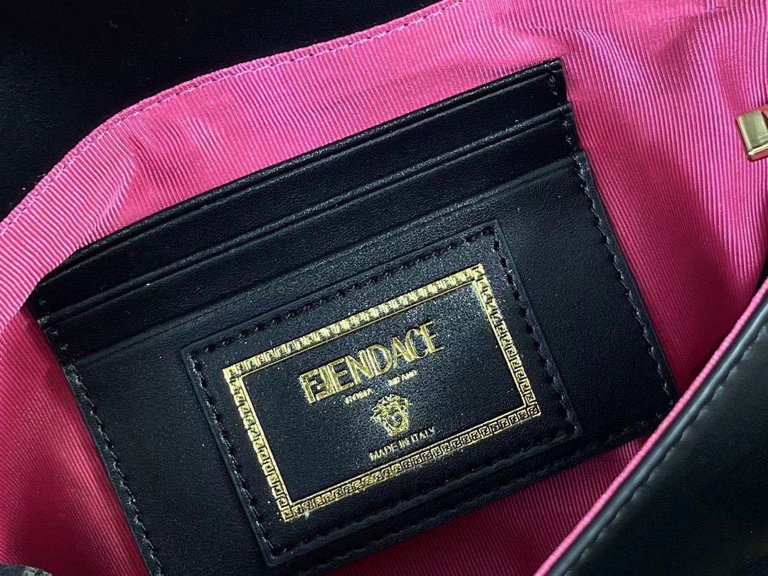 F-I Joint mini golden laser baguette bag in Milan Fashion Week street shooting.