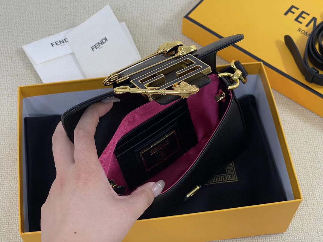 F-I Joint mini golden laser baguette bag in Milan Fashion Week street shooting.