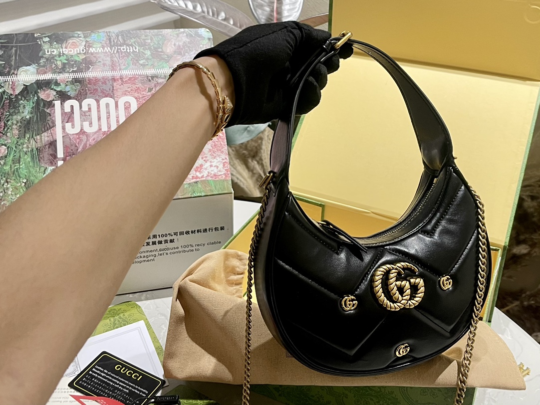 G-G Marmonto has another half-moon bag.
