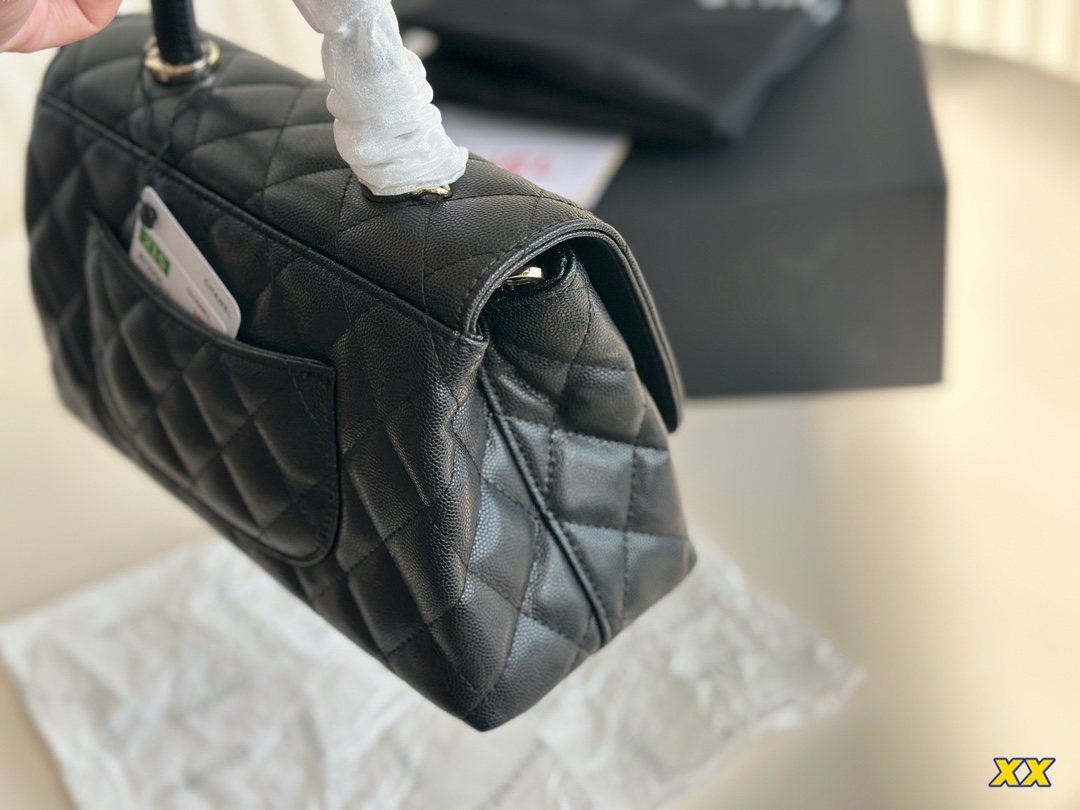 C-L Coco handle bag named after Miss Coco Fairy.