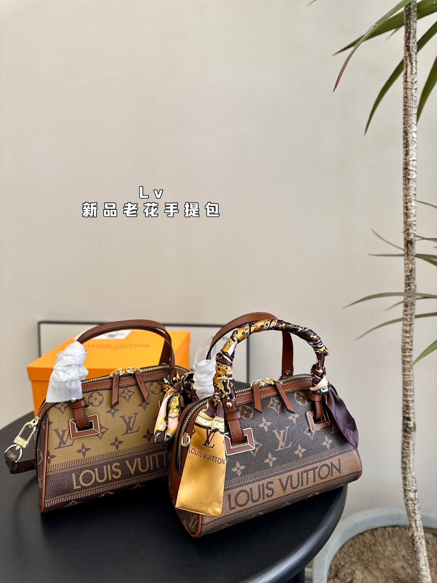 L-V New handbag, very practical and versatile.