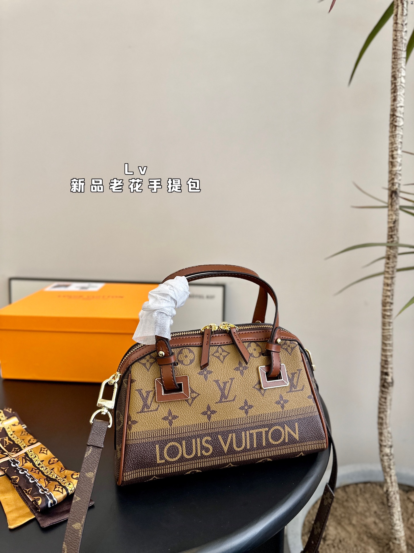 L-V New handbag, very practical and versatile.