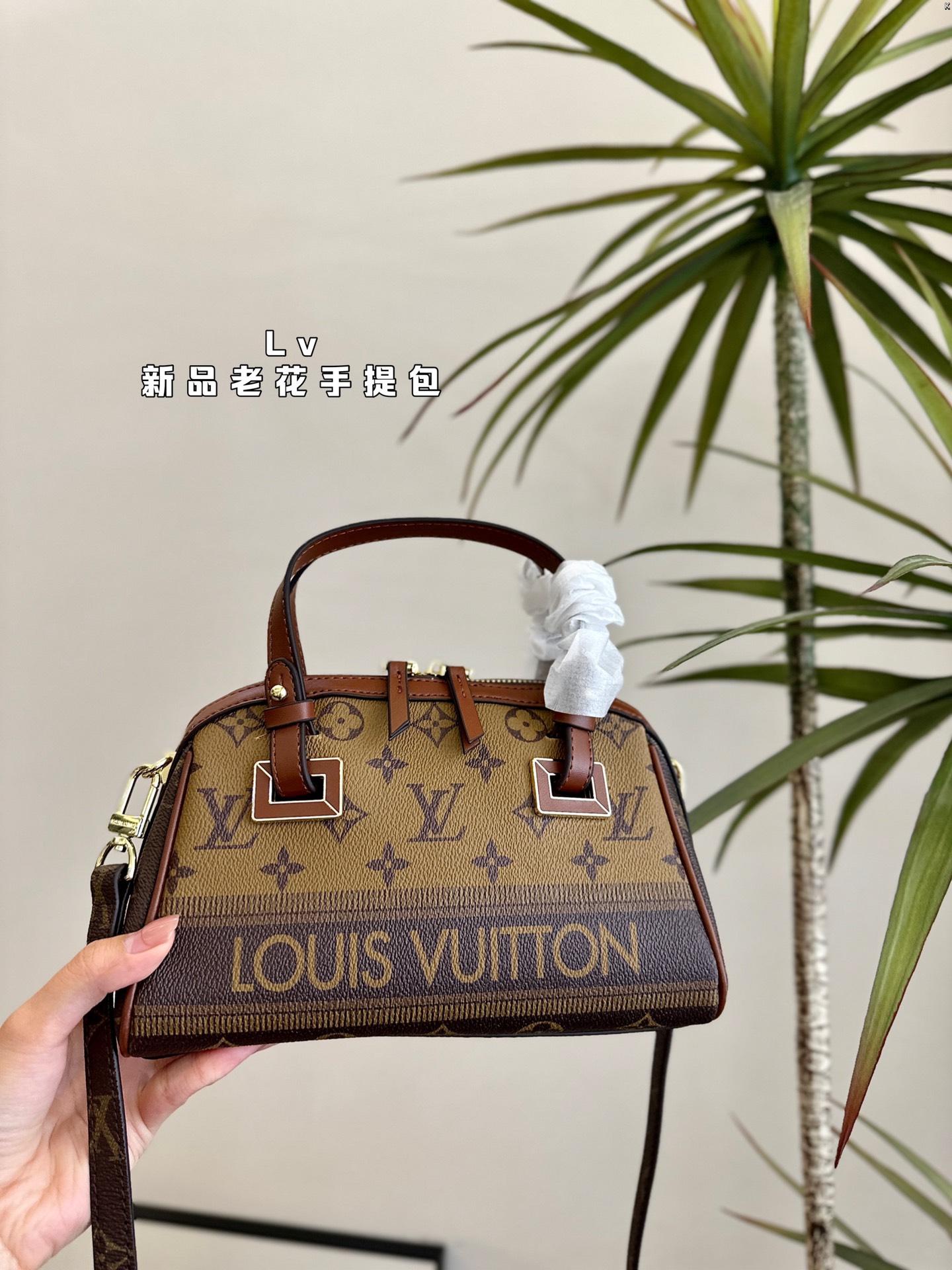 L-V New handbag, very practical and versatile.