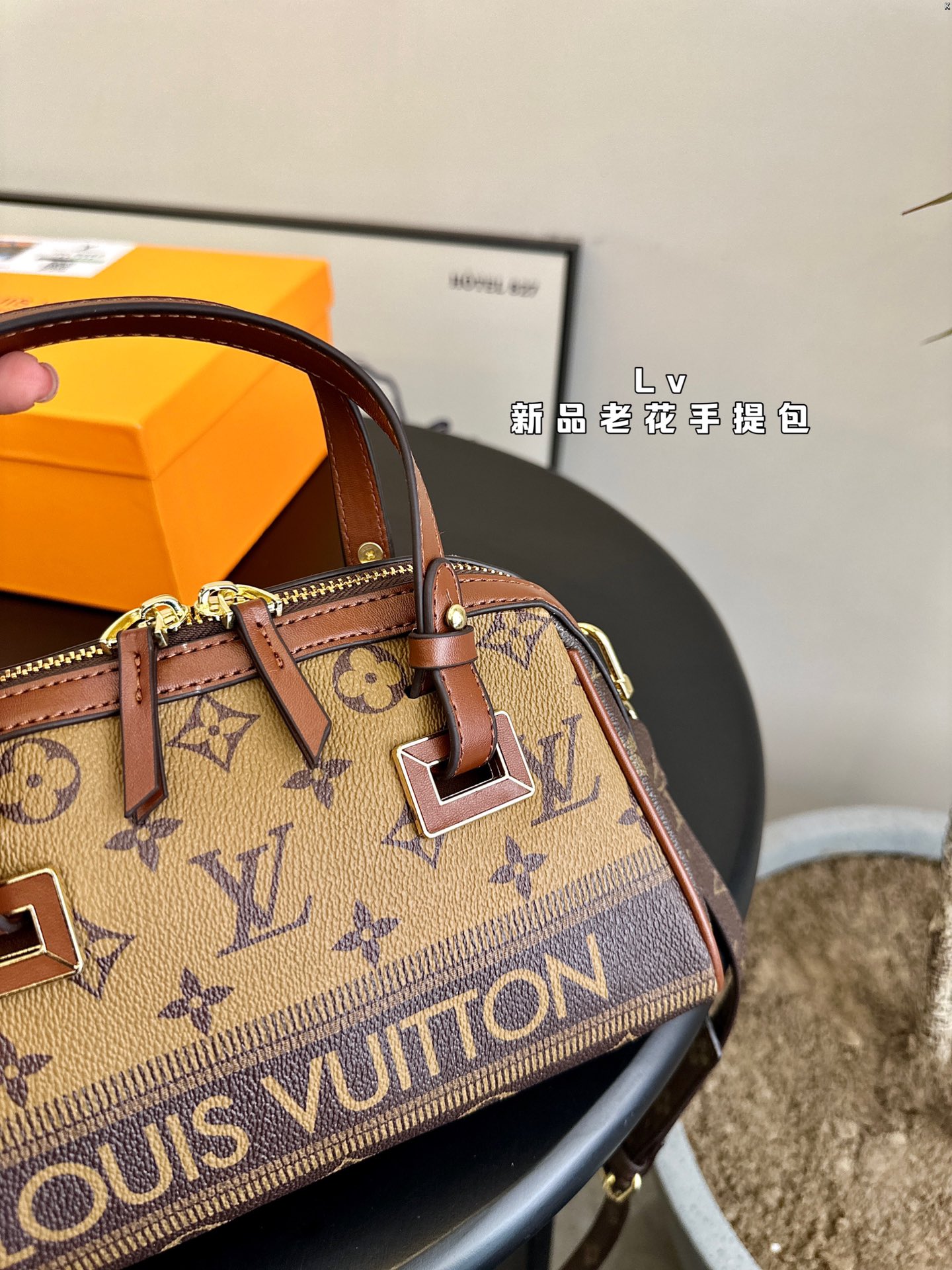 L-V New handbag, very practical and versatile.