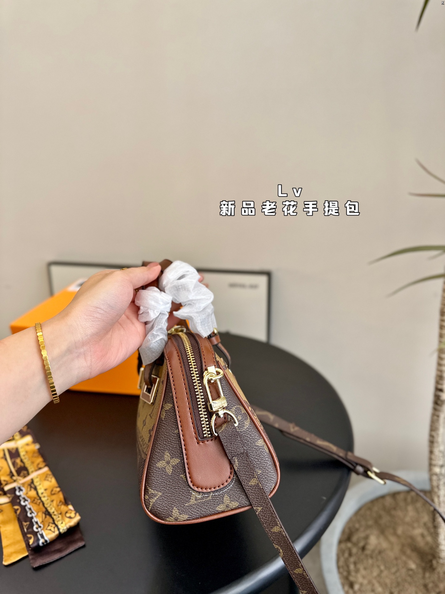 L-V New handbag, very practical and versatile.