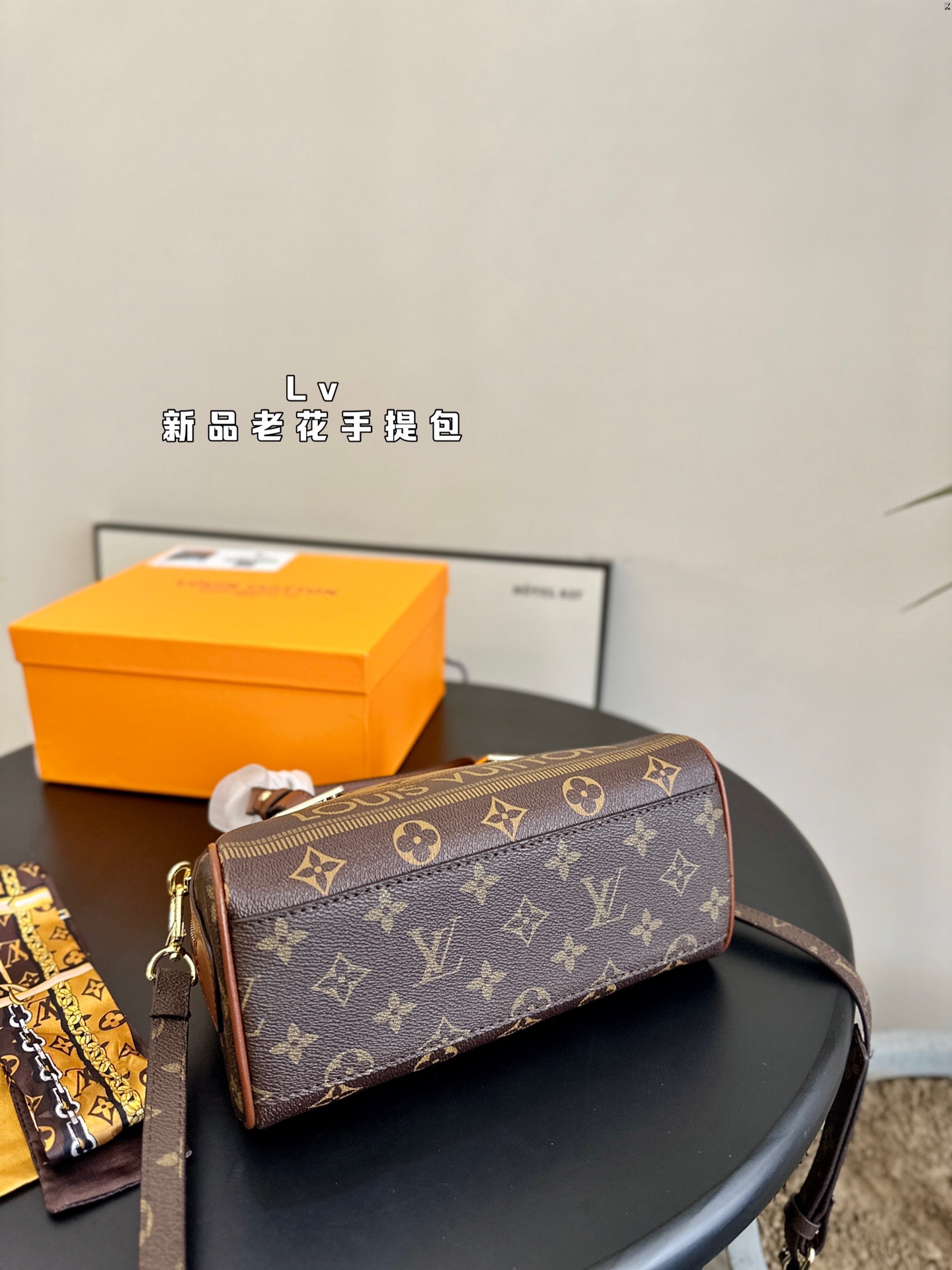 L-V New handbag, very practical and versatile.