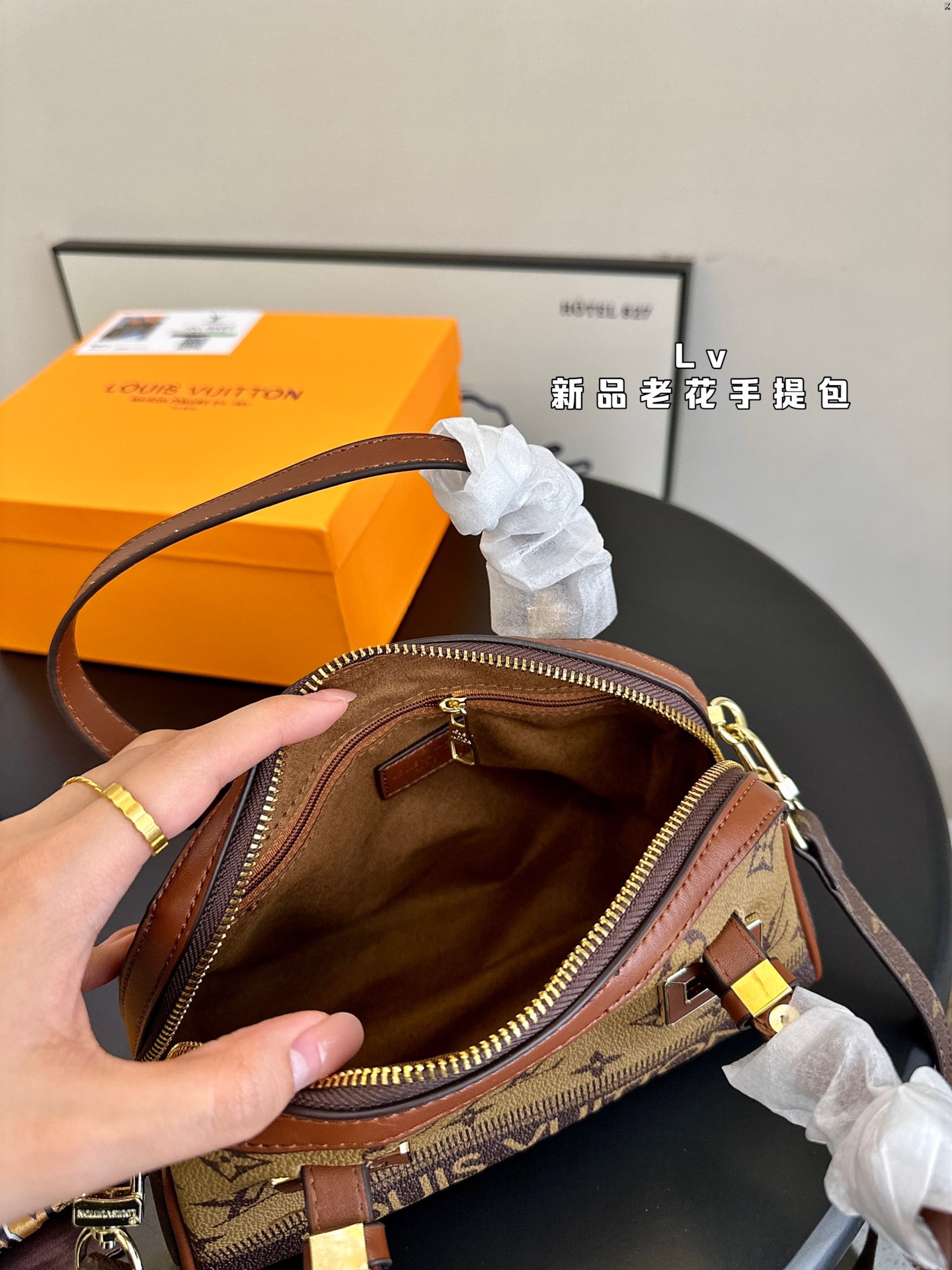 L-V New handbag, very practical and versatile.