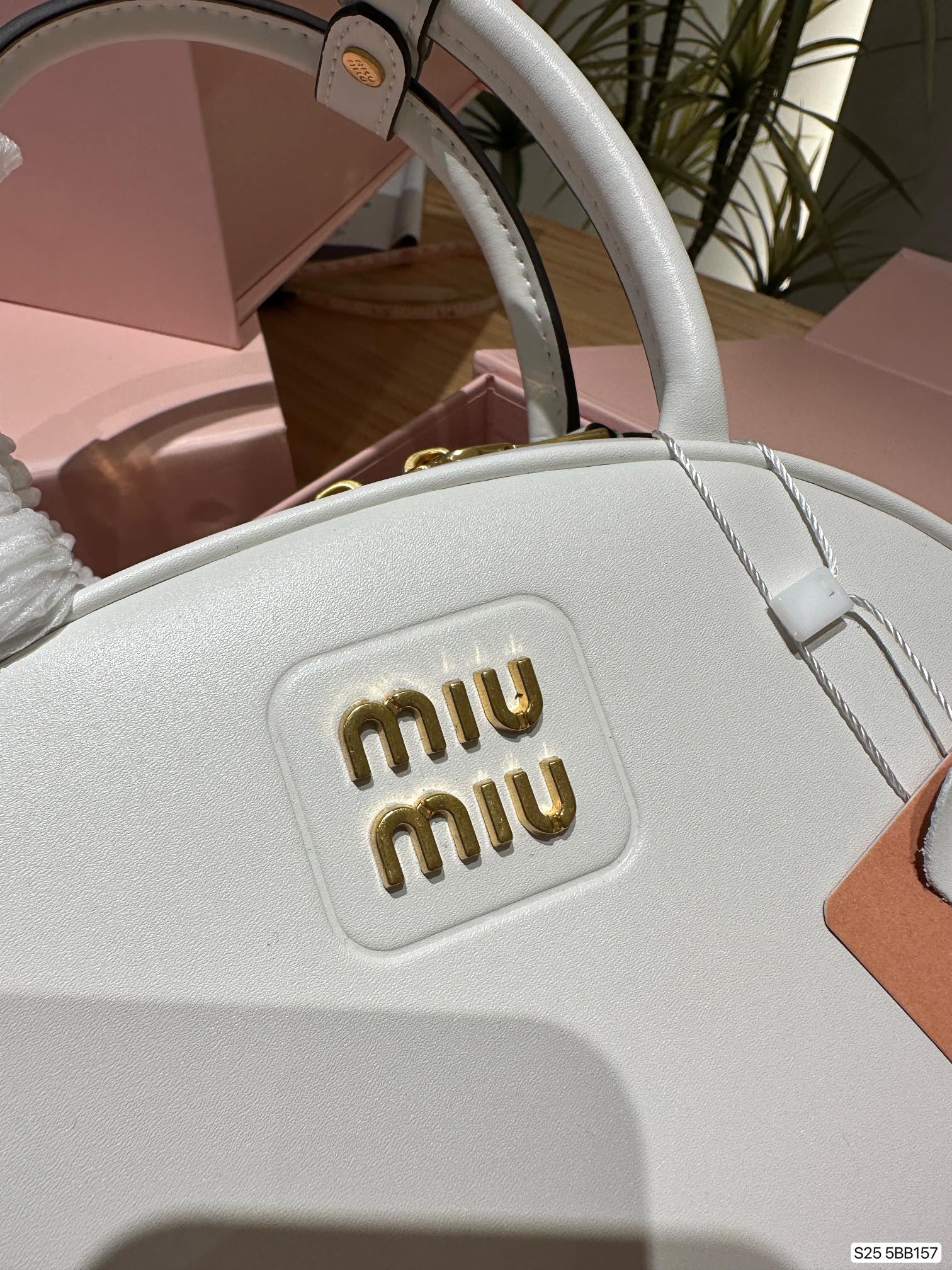 MIU Shell half moon bag