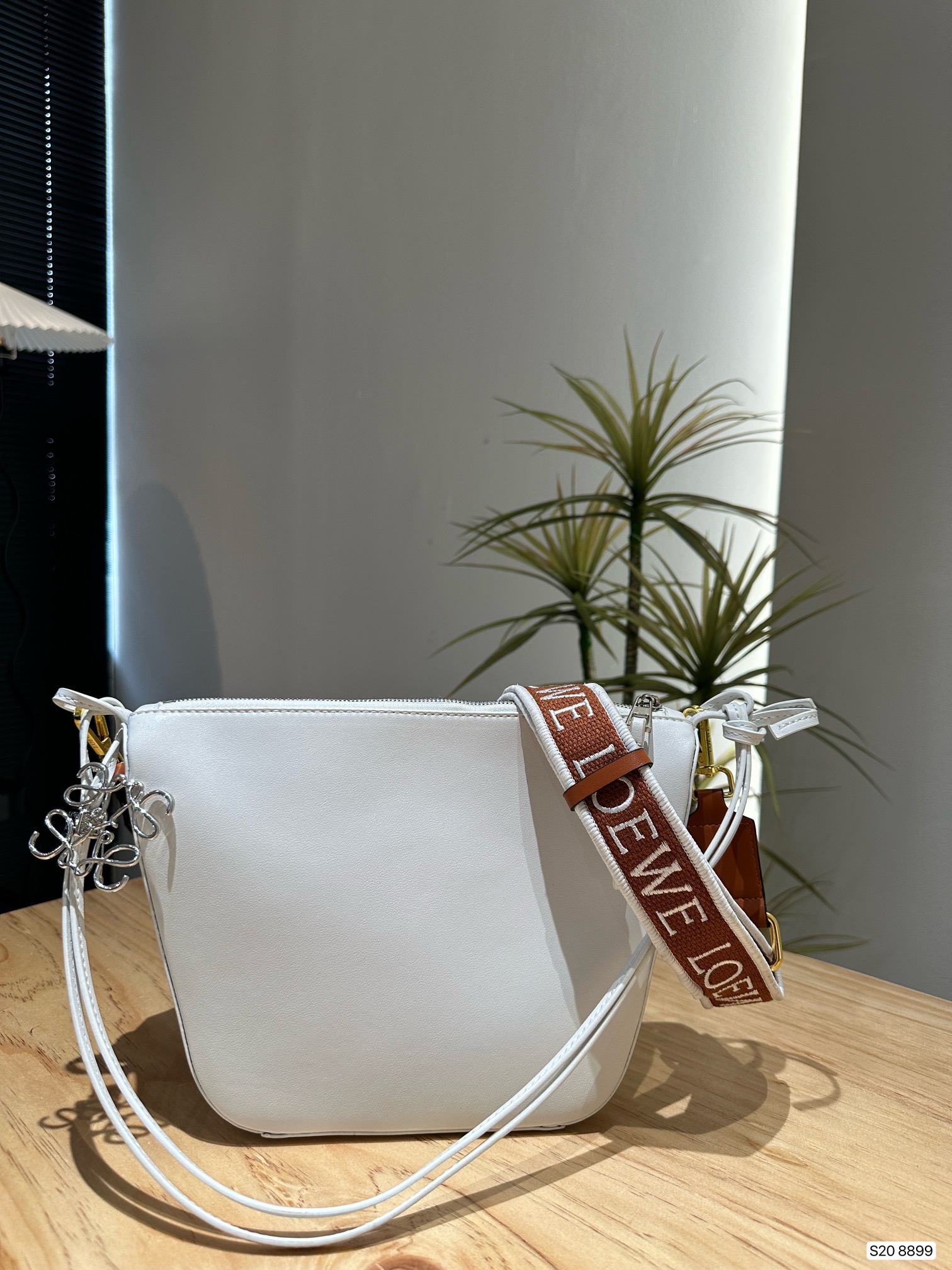 L-E Hobo super lightweight minimalist advanced bag design, Mao Mao pendant, herringbone pattern inside the village.