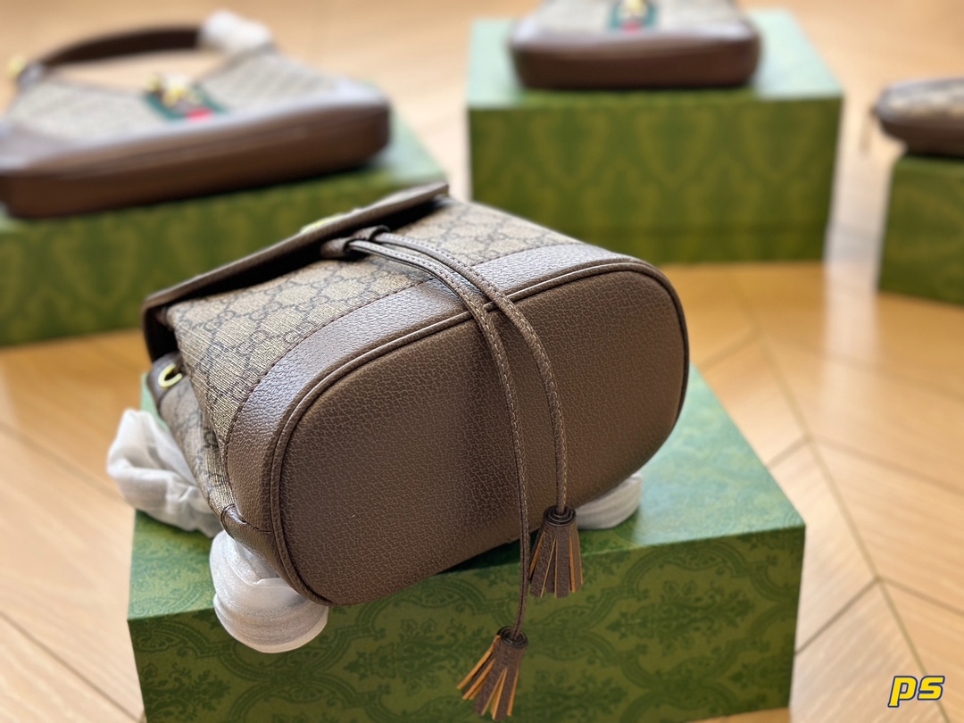 G-G mini backpack/backpack Beige and ebony GG with brown leather and adjustable shoulder strap.